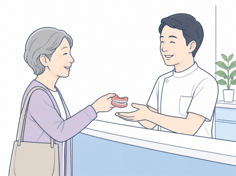義歯を返却する様子